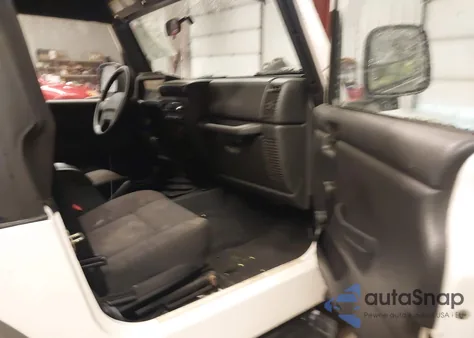 2004 Jeep Wrangler X z USA, uszkodzony, nr VIN 1J4FA39S84P701132